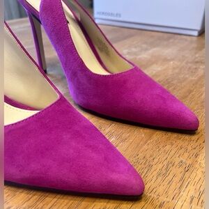 Nine W. slingback, dark pink heels. Worn one time. Excellent condition.